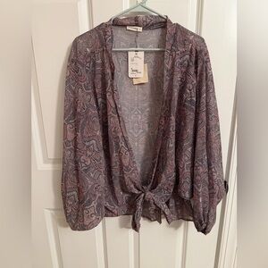 NWT women’s medium sheer overlay blouse w/ a paisley pattern tie-front closure.
